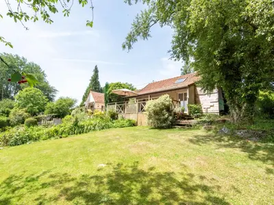 Jardin de l'établissement Holiday Home de Beaumont by Interhome