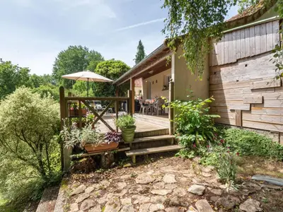 Jardin de l'établissement Holiday Home de Beaumont by Interhome