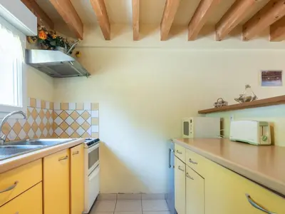 Cuisine ou kitchenette dans l'établissement Holiday Home de Beaumont by Interhome