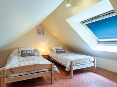 Un ou plusieurs lits dans un hébergement de l'établissement Holiday Home de Beaumont by Interhome