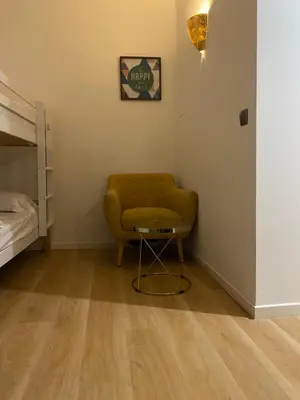 Un ou plusieurs lits dans un hébergement de l'établissement Home SAINT MICHEL