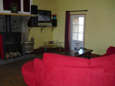 Télévision ou salle de divertissement dans l'établissement Vacances à Réthoville
