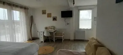 Télévision ou salle de divertissement dans l'établissement Escales dans les dunes