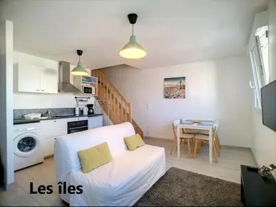 Cuisine ou kitchenette dans l'établissement Beau duplex et studio proche de la mer