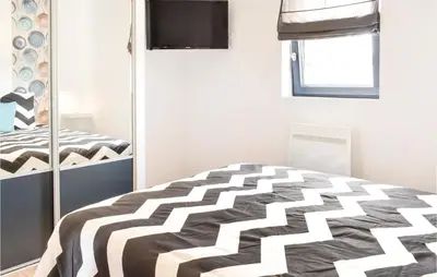 Un ou plusieurs lits dans un hébergement de l'établissement Gorgeous Home In Créances With Wifi