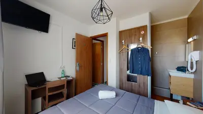 Un ou plusieurs lits dans un hébergement de l'établissement Hôtel Les Pieux En Cotentin