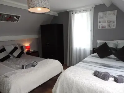 Un ou plusieurs lits dans un hébergement de l'établissement Chambres d'Hotes La Maison Neuve