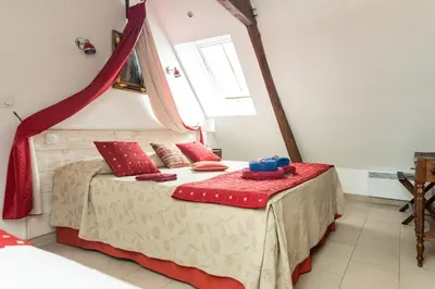 Un ou plusieurs lits dans un hébergement de l'établissement Le Clos des Courtines - Meuvaines