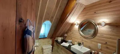 Salle de bains dans l'établissement Manoir de Turqueville les Quatre Etoiles