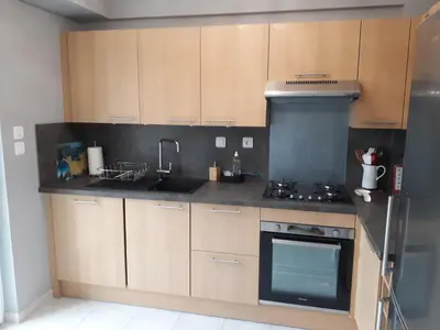 Cuisine ou kitchenette dans l'établissement Gîte 