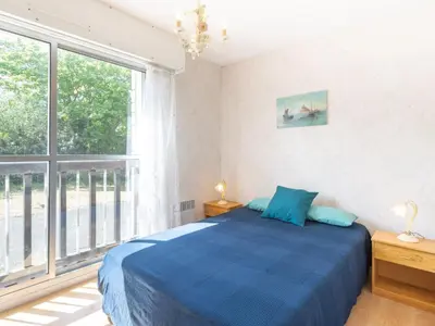 Un ou plusieurs lits dans un hébergement de l'établissement Apartment Résidence du Port-2 by Interhome