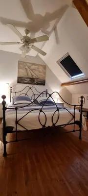 Un ou plusieurs lits dans un hébergement de l'établissement Chambres d'Hôtes Ferme de la Baie