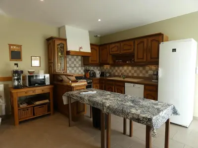 Cuisine ou kitchenette dans l'établissement Le Tertre