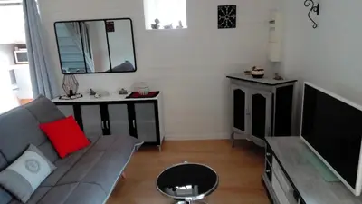 Télévision ou salle de divertissement dans l'établissement Le Petit Montceaux