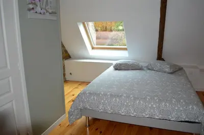 Un ou plusieurs lits dans un hébergement de l'établissement Gîte de L'Hotel Mahey