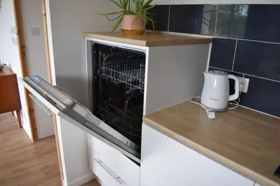 Cuisine ou kitchenette dans l'établissement Les sapins verts -inspiration deluxe