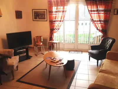 Télévision ou salle de divertissement dans l'établissement Duplex Barfleur