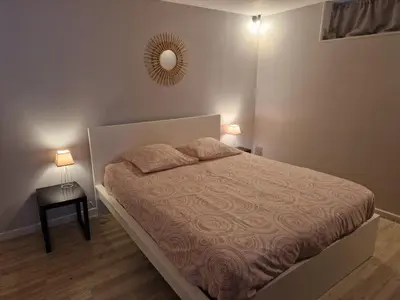 Un ou plusieurs lits dans un hébergement de l'établissement Appartement RDC Centre Cabourg
