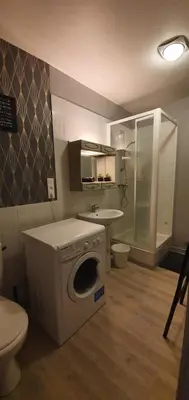Cuisine ou kitchenette dans l'établissement Appartement RDC Centre Cabourg