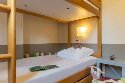 Un ou plusieurs lits dans un hébergement de l'établissement Pierre & Vacances Premium Residence & Spa Houlgate