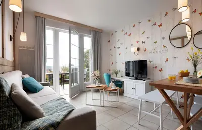 Télévision ou salle de divertissement dans l'établissement Pierre & Vacances Premium Residence & Spa Houlgate