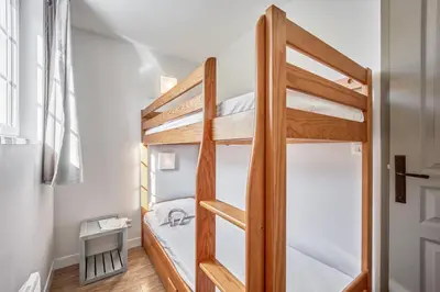 Un ou plusieurs lits dans un hébergement de l'établissement Pierre & Vacances Premium Residence & Spa Houlgate