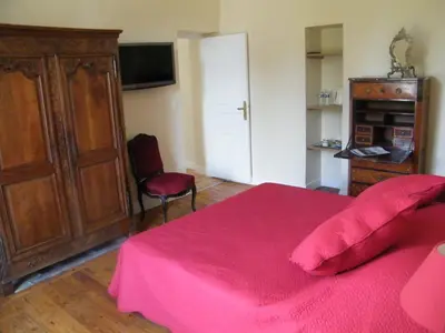 Télévision ou salle de divertissement dans l'établissement Chambres d'Hôtes Château de Damigny