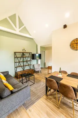Coin salon dans l'établissement Les prairies du Mont - Le gite de La Chapelle