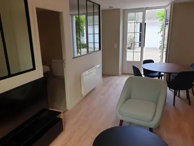 Coin salon dans l'établissement Au Loup Historic Apartments