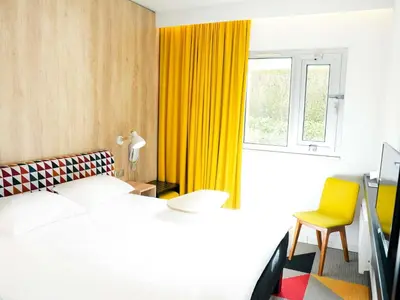Un ou plusieurs lits dans un hébergement de l'établissement ibis Styles Caen Centre Historique