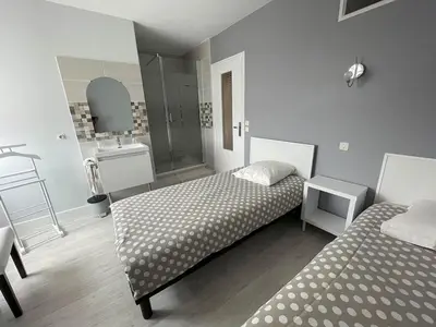 Un ou plusieurs lits dans un hébergement de l'établissement Chambres d'hôtes La Mansardière