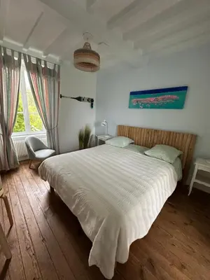 Un ou plusieurs lits dans un hébergement de l'établissement Chambres d'Hôtes Le Clos Tassin