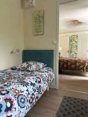 Un ou plusieurs lits dans un hébergement de l'établissement Chambres d'Hôtes Le Clos Tassin