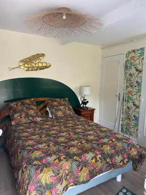 Un ou plusieurs lits dans un hébergement de l'établissement Chambres d'Hôtes Le Clos Tassin