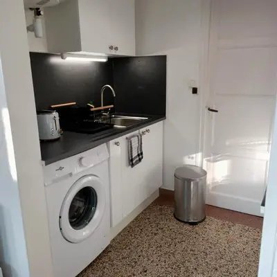 Cuisine ou kitchenette dans l'établissement Studio Calme