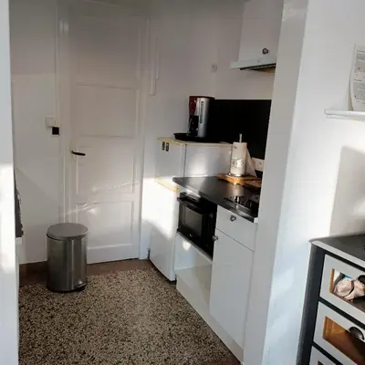 Cuisine ou kitchenette dans l'établissement Studio Calme