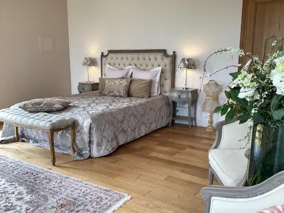 Un ou plusieurs lits dans un hébergement de l'établissement Au Château