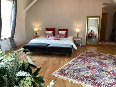 Un ou plusieurs lits dans un hébergement de l'établissement Au Château
