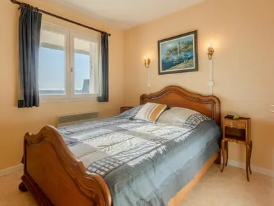Un ou plusieurs lits dans un hébergement de l'établissement Apartment Cap Cabourg-19 by Interhome