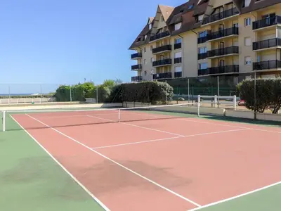 Tennis ou squash au sein de l'appartement ou à proximité