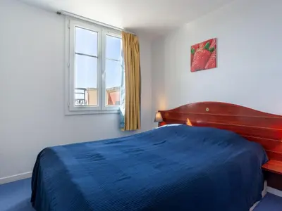 Un ou plusieurs lits dans un hébergement de l'établissement Apartment Port Guillaume-6 by Interhome