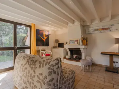 Coin salon dans l'établissement Holiday Home Le Clos du Golf-2 by Interhome