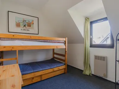Un ou plusieurs lits dans un hébergement de l'établissement Holiday Home Le Clos du Golf-2 by Interhome