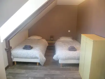 Un ou plusieurs lits dans un hébergement de l'établissement Villa centre ville à 100m de la plage, pour 20 personnes