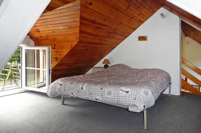 Un ou plusieurs lits dans un hébergement de l'établissement Chalet near Mont St Michel & Nature Trails