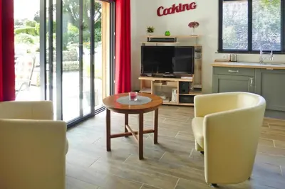 Coin salon dans l'établissement Holiday Home in Normandy near Sandy Beaches