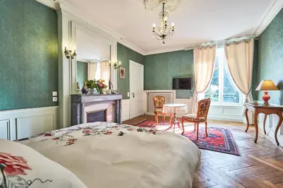 Un ou plusieurs lits dans un hébergement de l'établissement Chateau des Monts