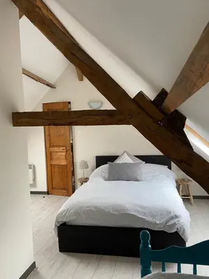 Un ou plusieurs lits dans un hébergement de l'établissement Gîte La Roche