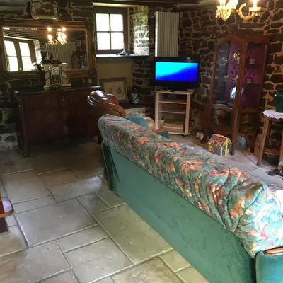 Télévision ou salle de divertissement dans l'établissement Lieu dit le jardin