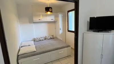 Un ou plusieurs lits dans un hébergement de l'établissement Appartement 2 pièces rez-de-jardin à 2 pas de la plage et de la thalasso